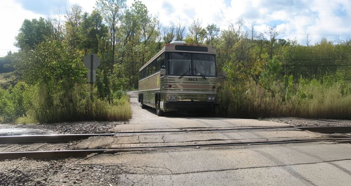 Getting a Bus Stuck at a Railroad Crossing - bus conversion photo