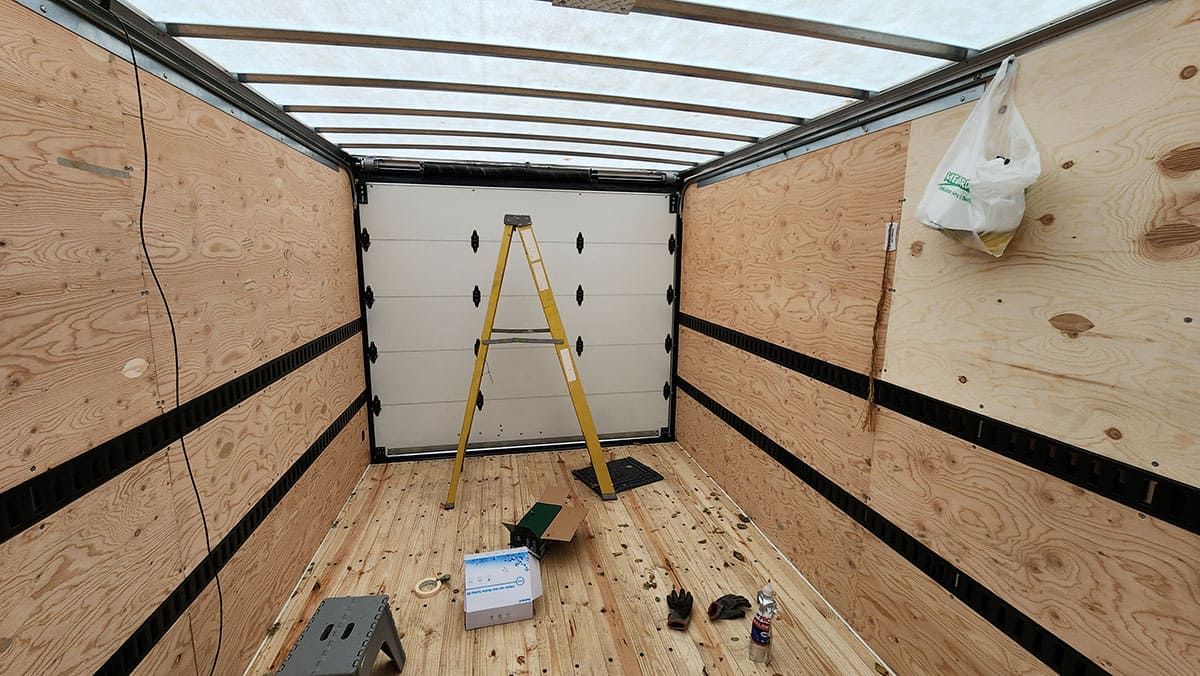 The inside OEM layout. Notice the translucent ceiling/roof and the e-tracks on the walls. 