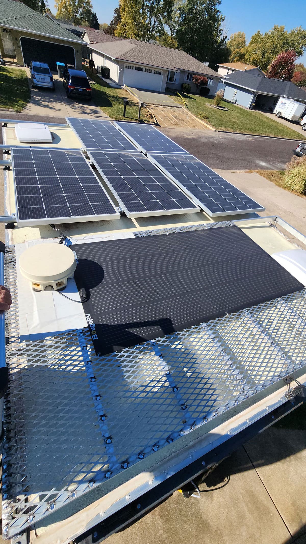 The completed solar array and small roof deck. The flat solar panel on the deck can be walked on.