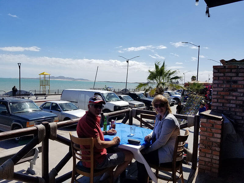 Canadians JC and Valerie Alacoque having dinner on Main Street in San Felipe