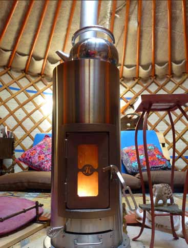 Cozy Wood Heat For a Bus Conversion - bus conversion photo