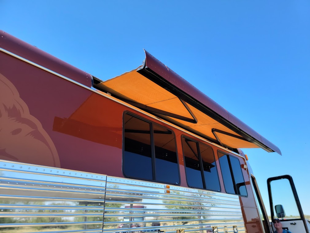 The 16-foot-long awnings tuck neatly into the roof and are hidden away when not in use.