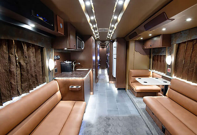 The front lounge area of an entertainer coach. 