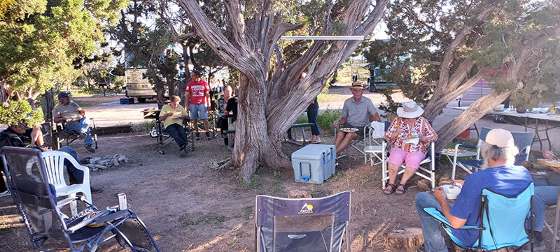 Dining in the shade under the trees.