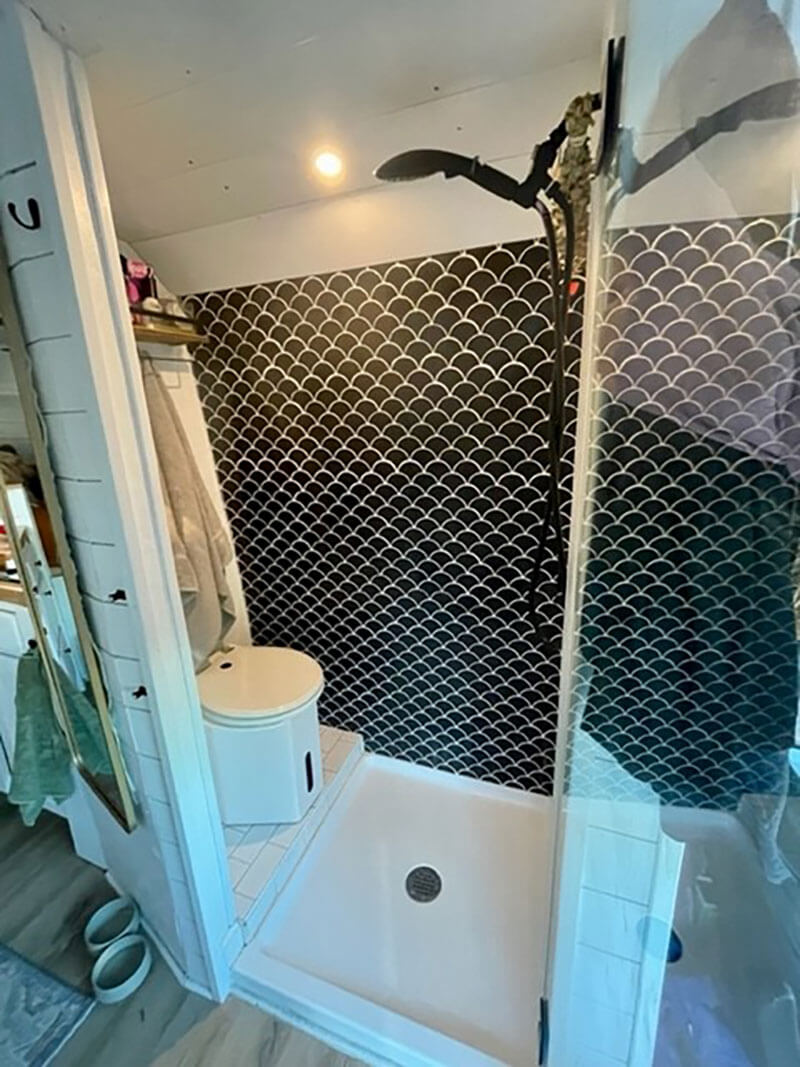 Our completed wet bath features a self-compost-ing toilet, the brand is C-Head.