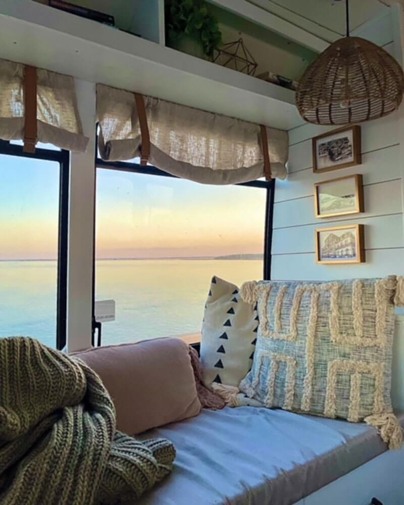 Our couch and “living space”. We built book-shelves on top and there are three storage draw-ers underneath the cushion.