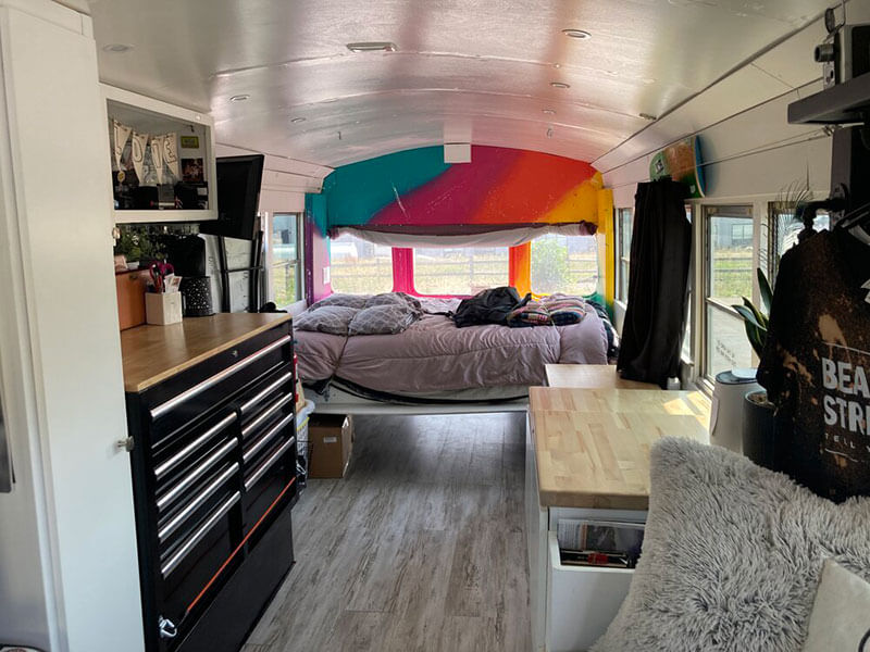 Queen size Puffy mattress on Murphy bed. The back wall is painted by Nashville 
artist Jocelyn Limme.