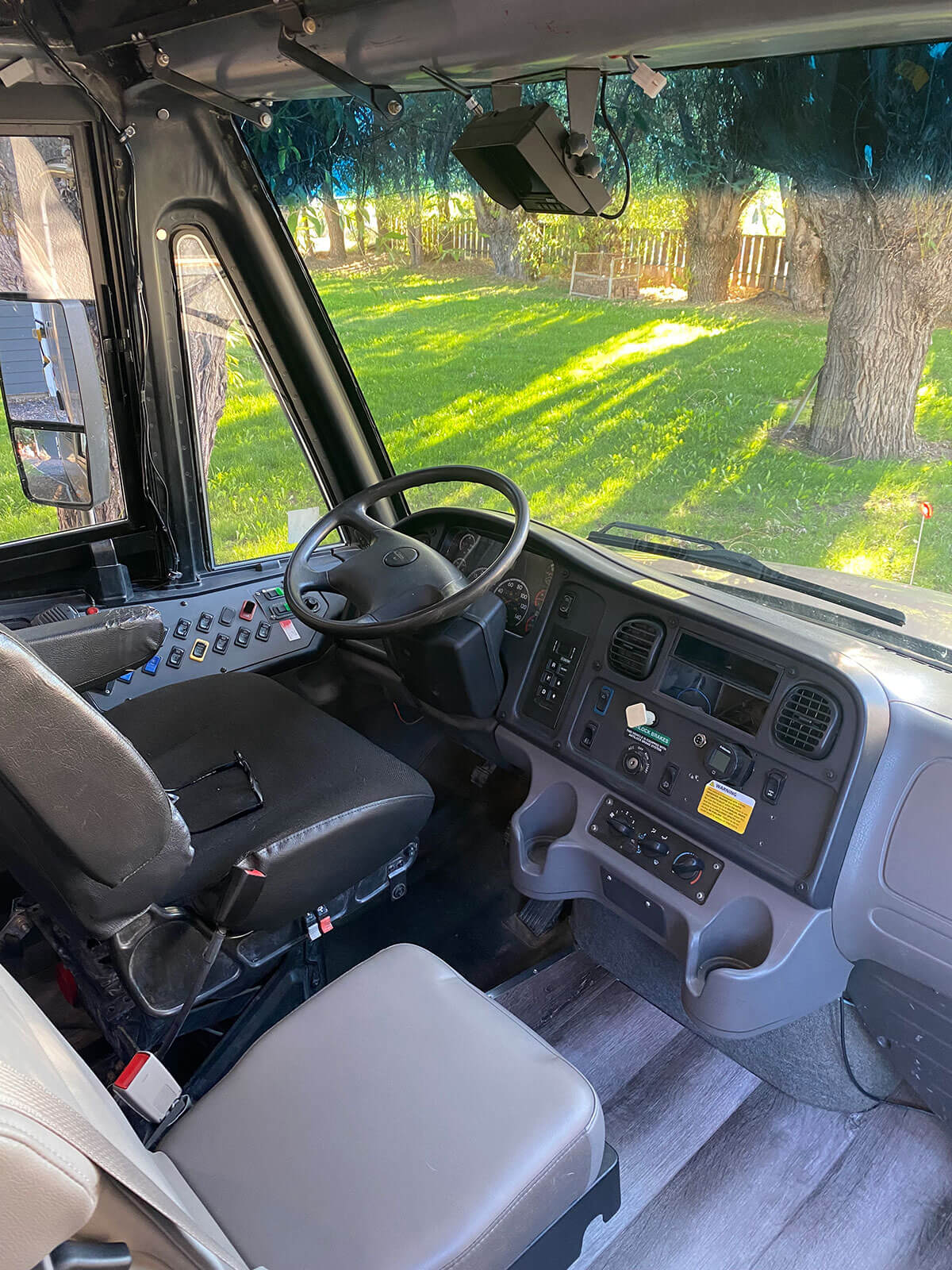 Kruzin’ in the Kraken - A 2013 Thomas Freightliner Skoolie - bus conversion photo