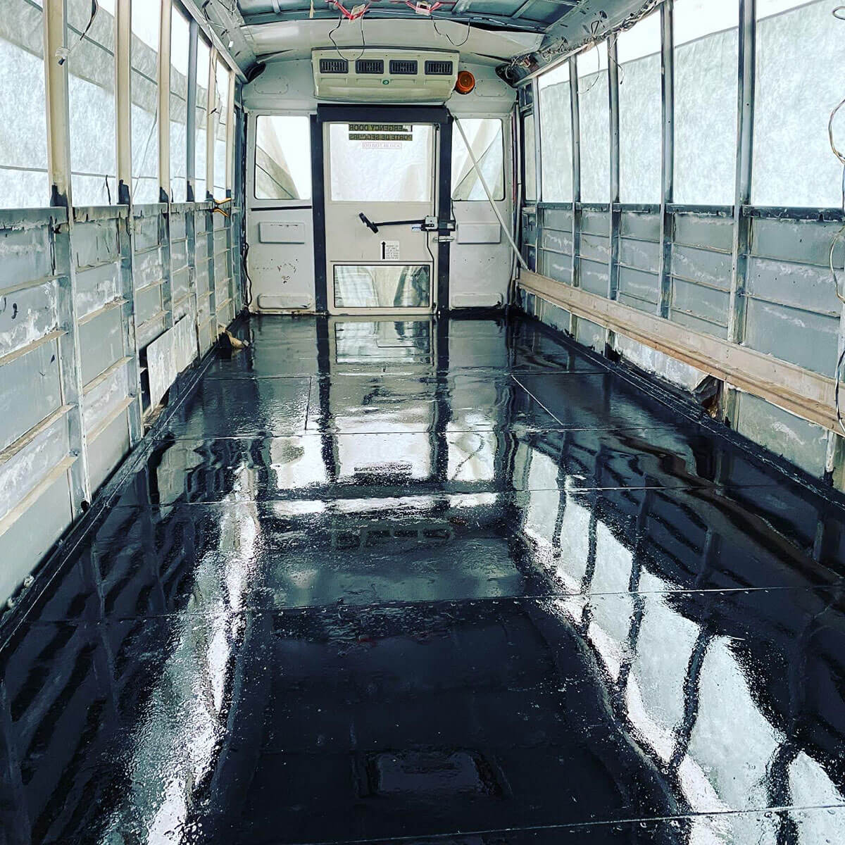 Kruzin’ in the Kraken - A 2013 Thomas Freightliner Skoolie - bus conversion photo