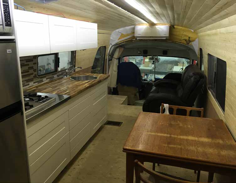 Comfort Year-Round With EHP (Insulating Your Bus Conversion) - bus conversion photo