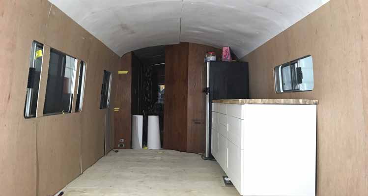 Comfort Year-Round With EHP (Insulating Your Bus Conversion) - bus conversion photo