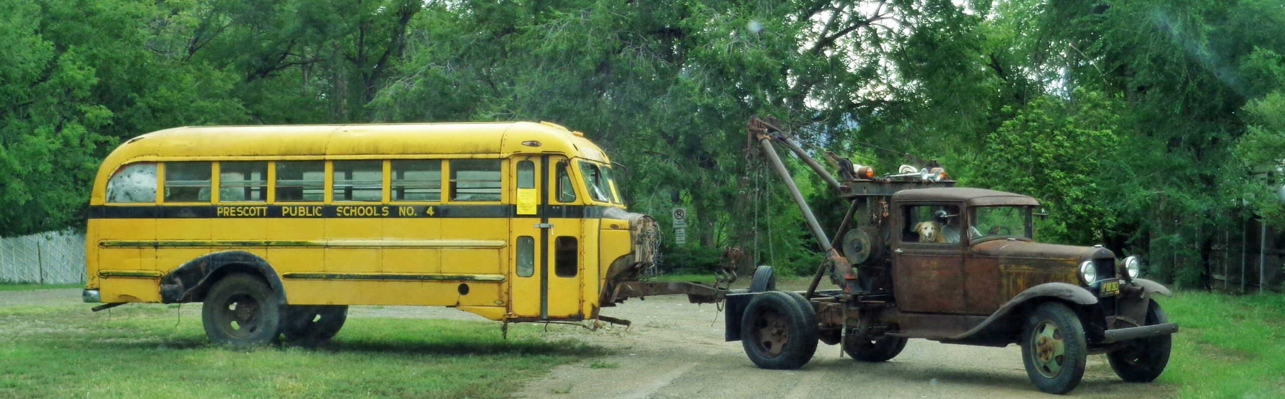 Bus #4 being hauled to the PAAC Club House by Pat Mackin’s Wrecker. 