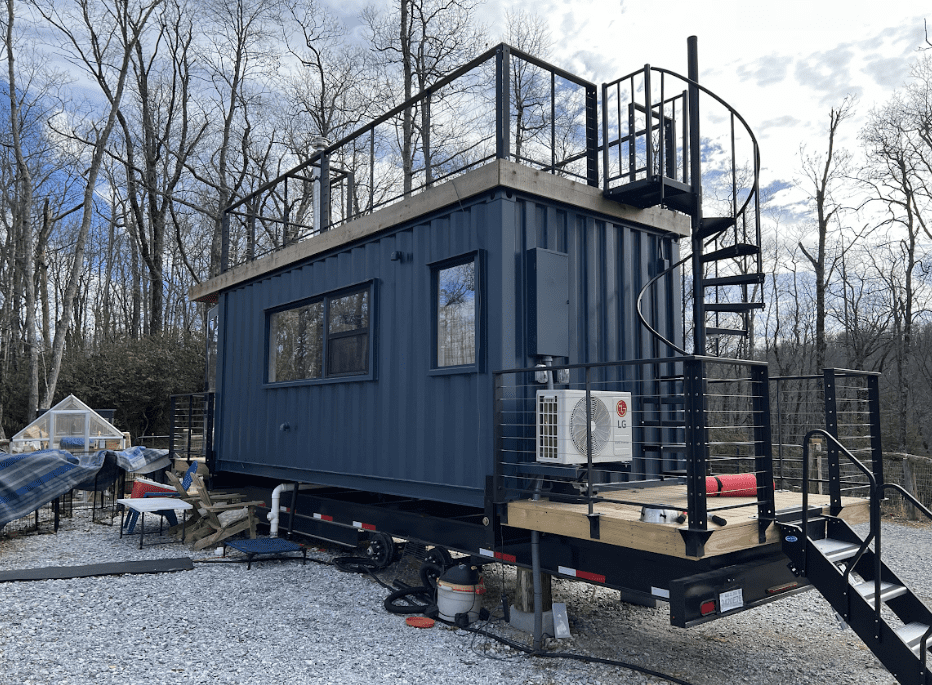 Container home heated by a Kimberly wood stove.