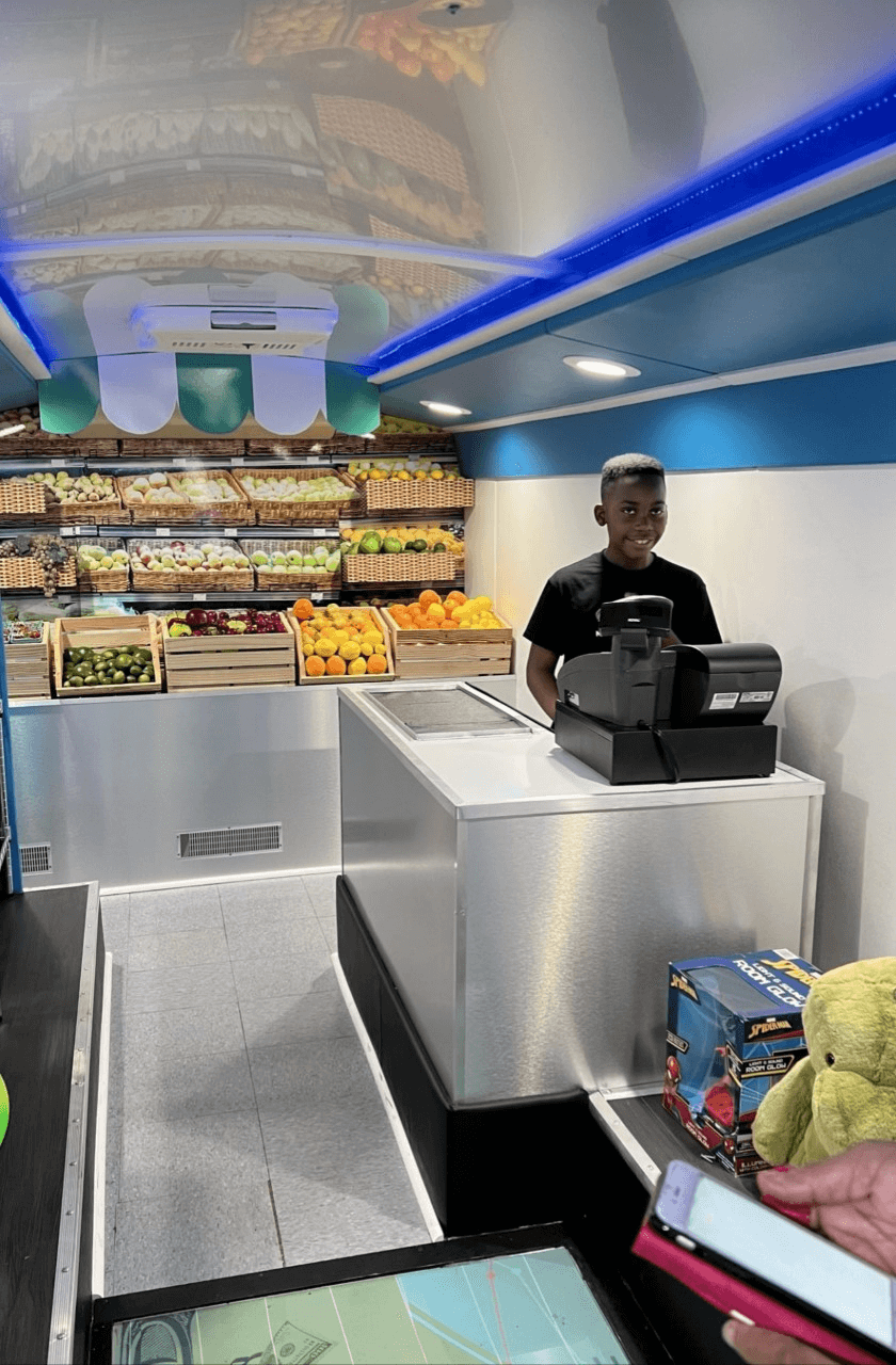 This is Caden’s corner market where kids learn to budget their money for grocery shopping