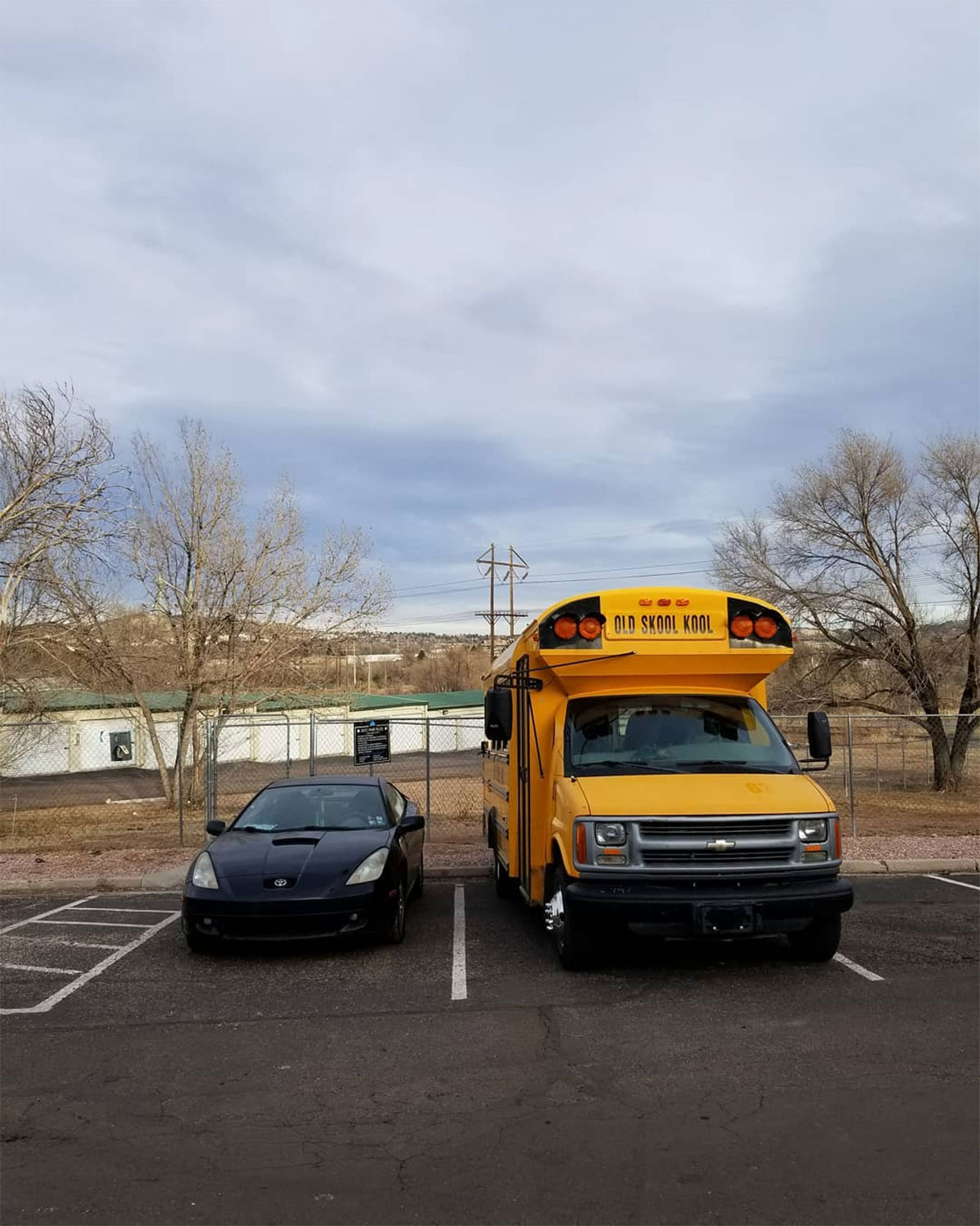 Pre-Budd the Bus next to my old car in my previous apartment parking lot.