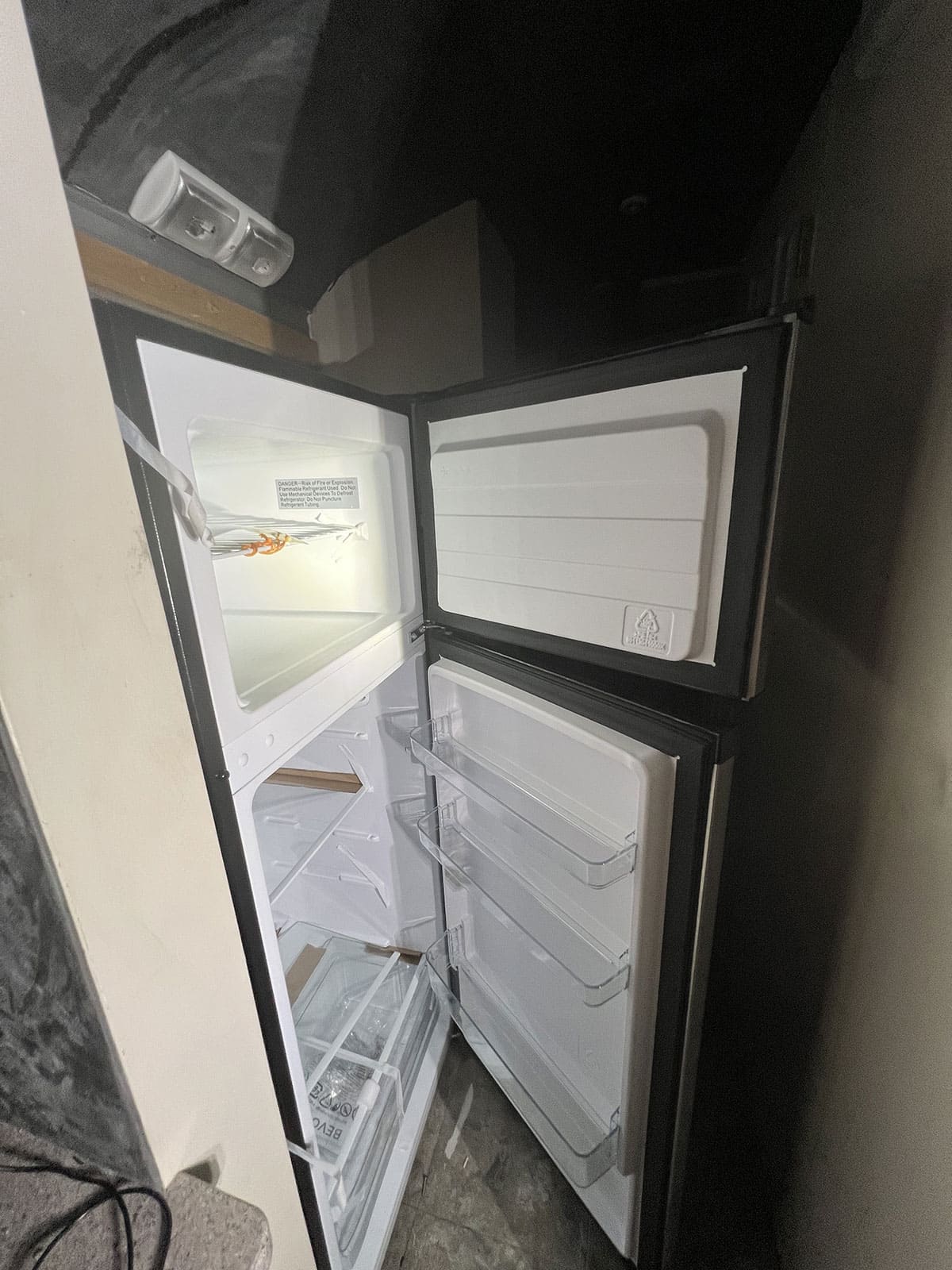 The refrigerator is a Bevoi 7.2 cu ft unit.